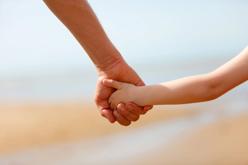 Does your child still hold your hand?